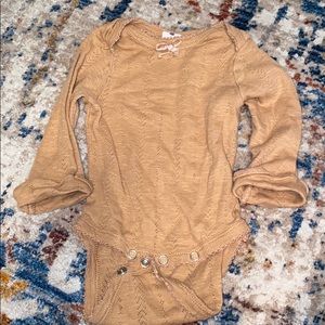 Pumpkin colored onesie. Like new.